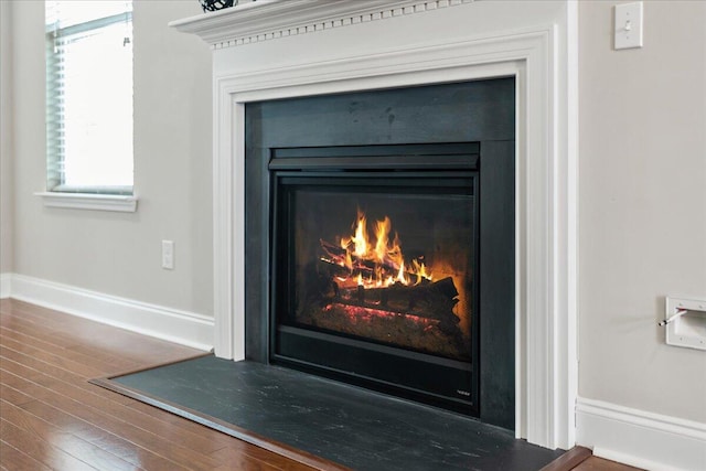 interior details featuring hardwood / wood-style flooring