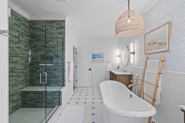 1530 Willtown St, Daniel Island, SC 29492 - bathroom featuring ornamental molding, vanity, a freestanding tub, a stall shower, and a wainscoted wall