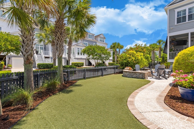 1530 Willtown St, Daniel Island, SC 29492 - fenced backyard with an outdoor fire pit