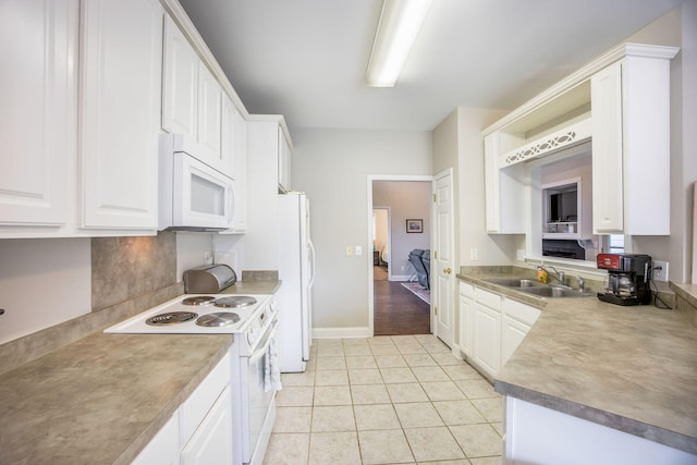 116 Holbrook Ln, Goose Creek, SC 29445 - kitchen with white appliances, a sink, and white cabinets