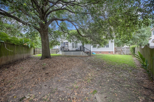 116 Holbrook Ln, Goose Creek, SC 29445 - fenced backyard with a wooden deck