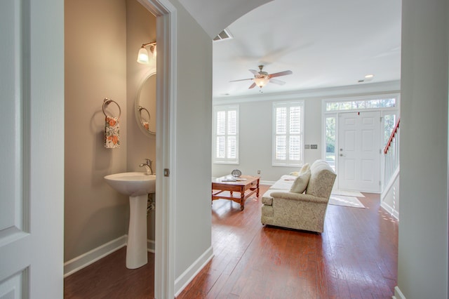 interior space featuring hardwood / wood-style flooring and ceiling fan