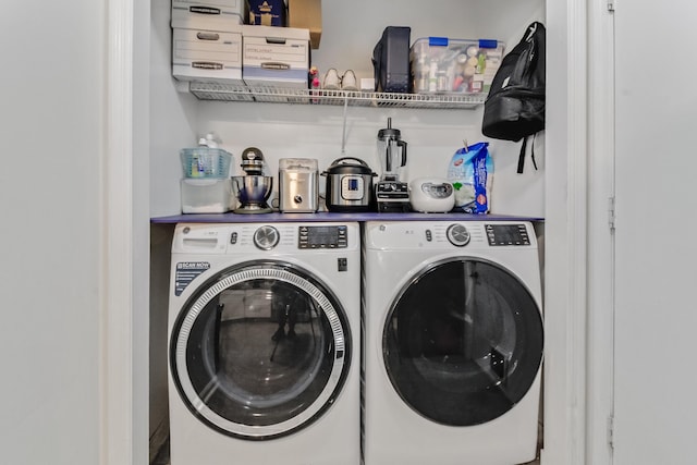 laundry room featuring independent washer and dryer