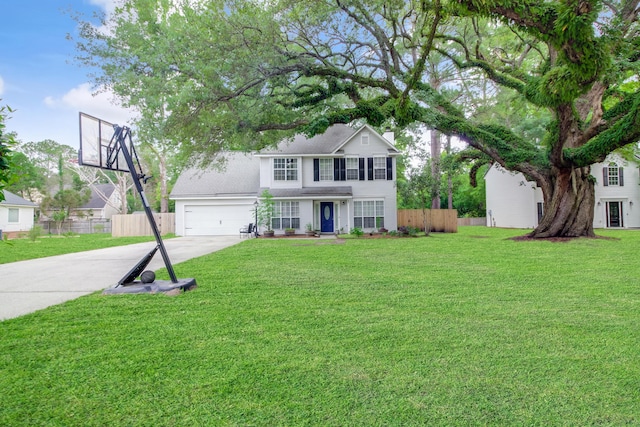 view of front of property with concrete driveway and an attached garage