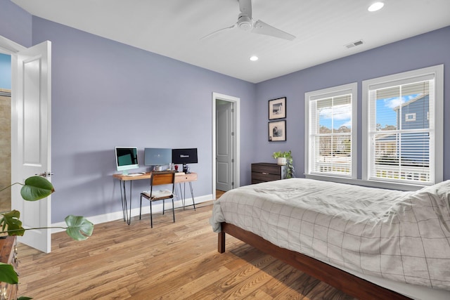 bedroom featuring recessed lighting, visible vents, a ceiling fan, wood finished floors, and baseboards