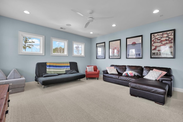 carpeted living area with baseboards, ceiling fan, visible vents, and recessed lighting