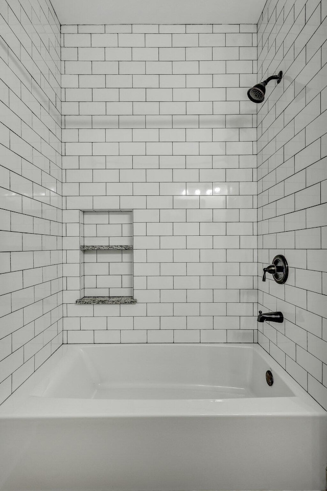 bathroom featuring shower / washtub combination