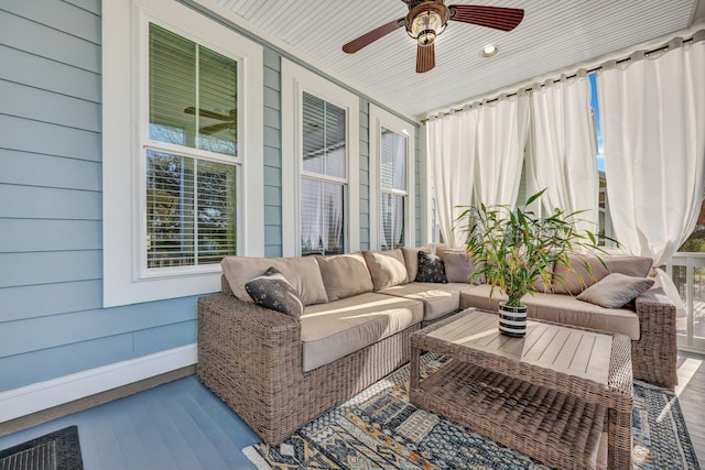 sunroom / solarium with ceiling fan