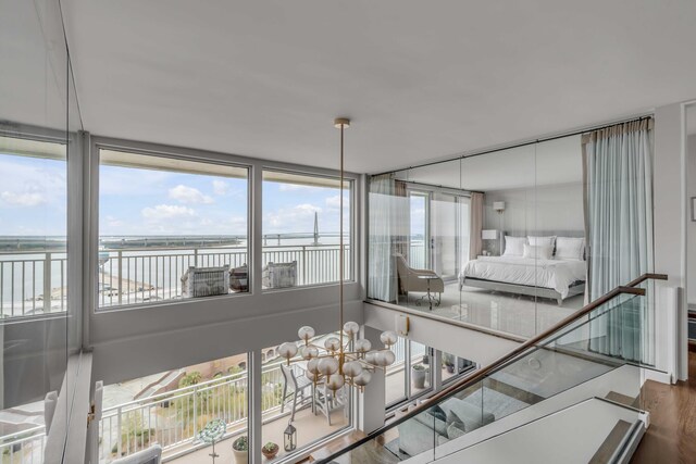330 Concord St Unit 18F, Charleston, SC 29401 - interior space with a water view and wood finished floors
