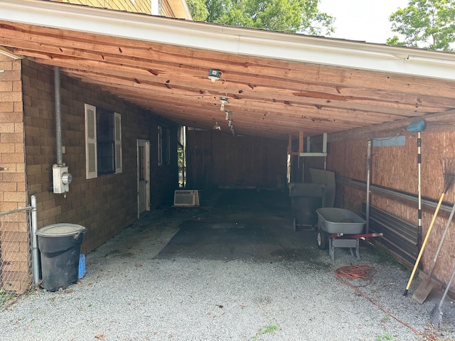 view of vehicle parking with a carport