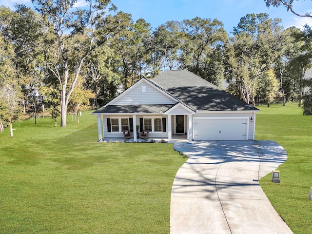 view of front of home featuring a front lawn and a garage