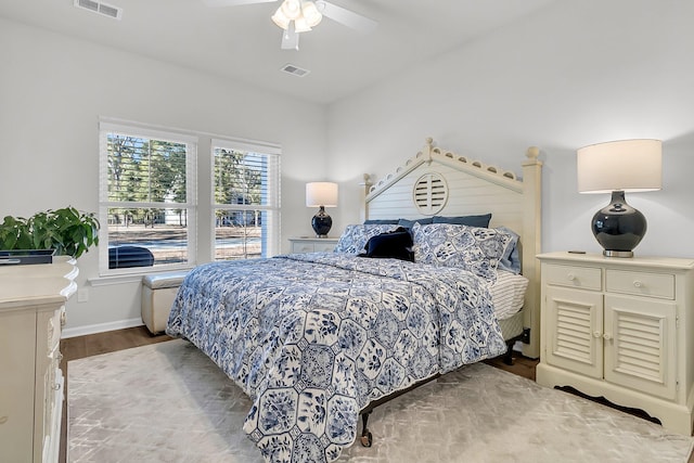 bedroom featuring light hardwood / wood-style flooring and ceiling fan