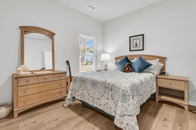 bedroom featuring light hardwood / wood-style floors