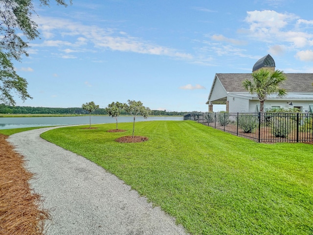 view of yard with a water view