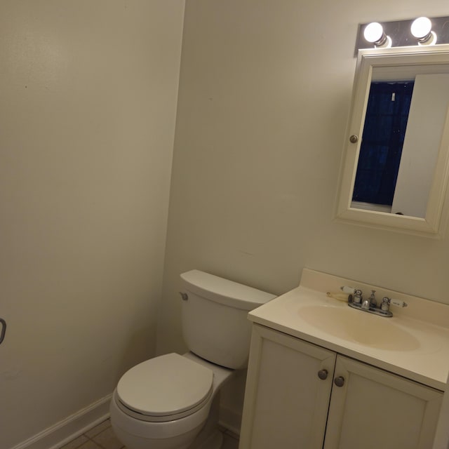 1601 Westmoreland Ave, Charleston, SC 29412 - half bathroom featuring vanity, toilet, tile patterned flooring, and baseboards