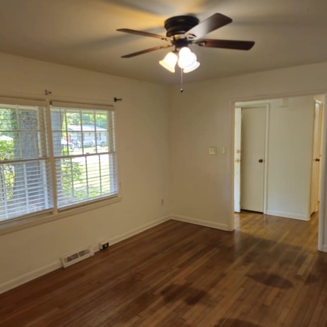 1601 Westmoreland Ave, Charleston, SC 29412 - unfurnished room featuring baseboards, wood finished floors, and a ceiling fan
