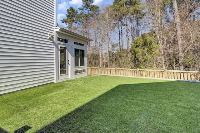 view of yard with fence