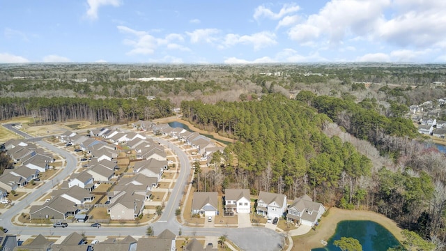 bird's eye view with a residential view and a view of trees