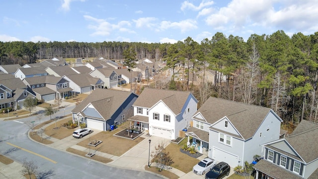 birds eye view of property with a residential view