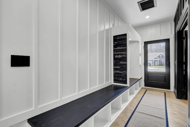 mudroom with recessed lighting and visible vents