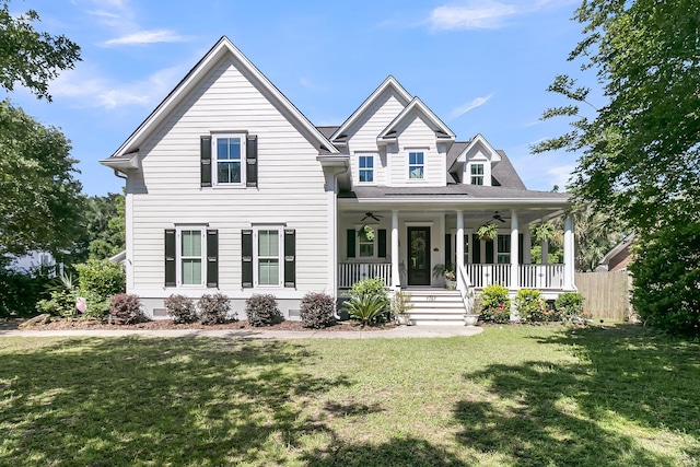 view of front facade featuring ceiling fan and a porch