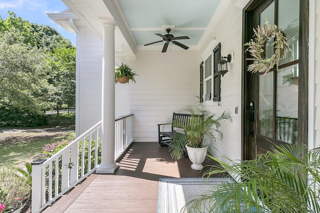 balcony with covered porch and ceiling fan