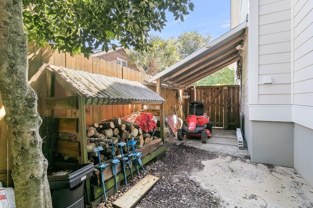 view of patio featuring fence