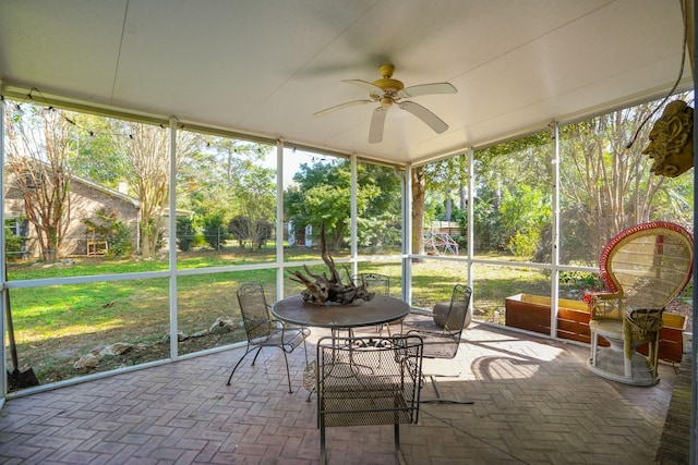 sunroom / solarium with ceiling fan