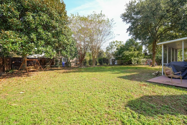 view of yard with a patio and a sunroom