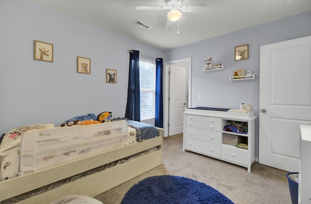 carpeted bedroom featuring ceiling fan