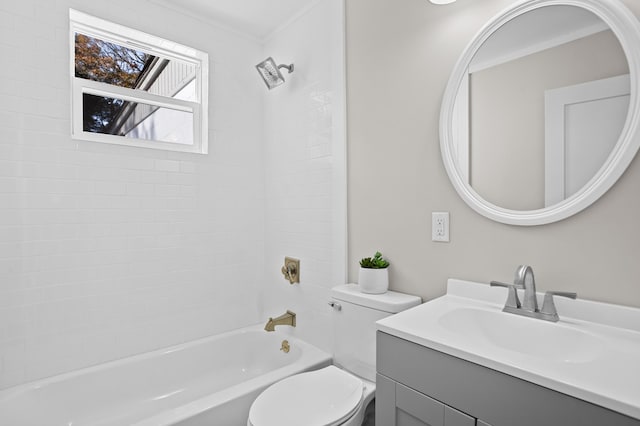 full bathroom featuring vanity, toilet, and tiled shower / bath combo