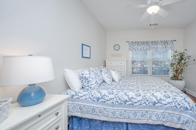 bedroom with visible vents, ceiling fan, and baseboards