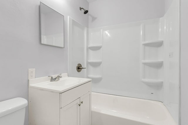 full bathroom with toilet, washtub / shower combination, and vanity