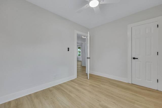 unfurnished bedroom featuring ceiling fan and light hardwood / wood-style floors