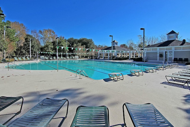 pool with a patio