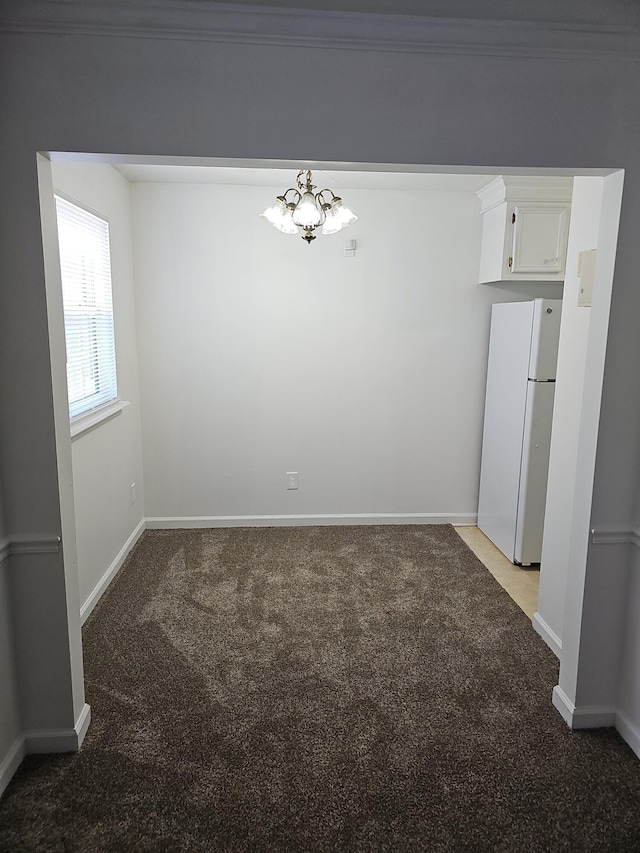 3930 Azalea Dr Unit W, North Charleston, SC 29405 - unfurnished dining area with light carpet and a chandelier