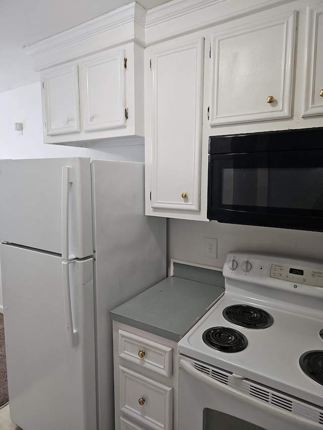 3930 Azalea Dr Unit W, North Charleston, SC 29405 - kitchen with white appliances and white cabinets