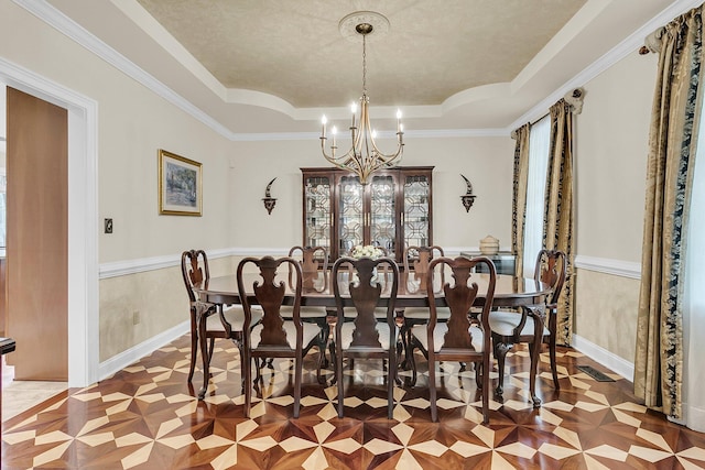 4702 Blockhouse Ln, Hollywood, SC 29449 - dining room featuring a chandelier, a tray ceiling, and baseboards