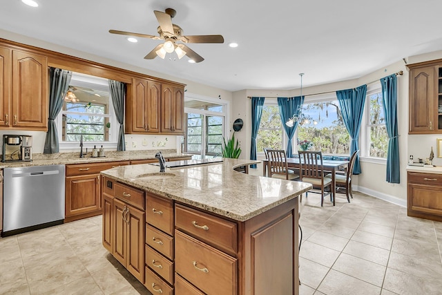 4702 Blockhouse Ln, Hollywood, SC 29449 - kitchen with stainless steel dishwasher, brown cabinets, a sink, and recessed lighting