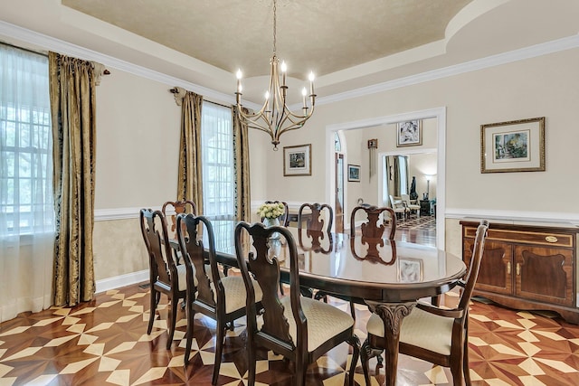4702 Blockhouse Ln, Hollywood, SC 29449 - dining space with a chandelier, a tray ceiling, and crown molding