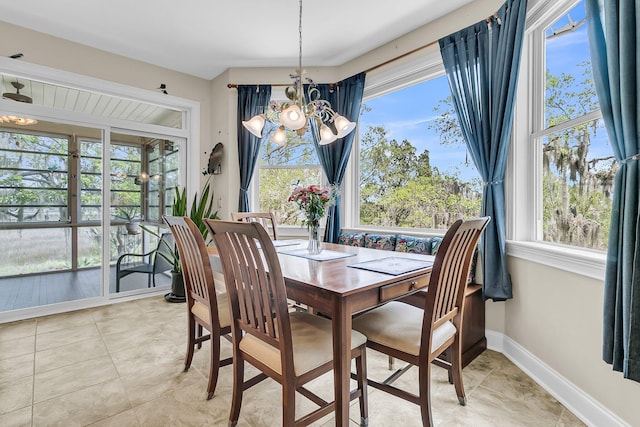 4702 Blockhouse Ln, Hollywood, SC 29449 - dining area with a chandelier, baseboards, and light tile patterned floors