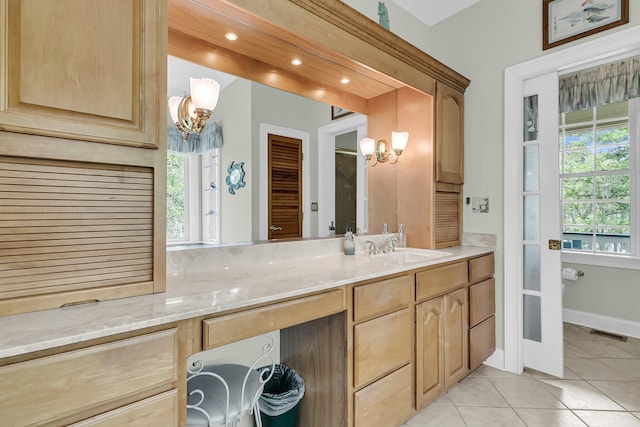 4702 Blockhouse Ln, Hollywood, SC 29449 - bathroom featuring a chandelier, tile patterned floors, vanity, and baseboards