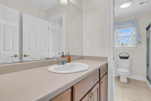4702 Blockhouse Ln, Hollywood, SC 29449 - full bath featuring vanity, toilet, a shower stall, tile patterned flooring, and baseboards