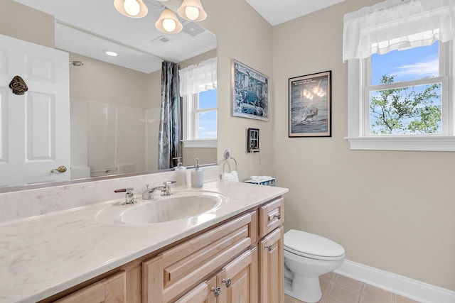 4702 Blockhouse Ln, Hollywood, SC 29449 - full bathroom with toilet, plenty of natural light, vanity, and baseboards