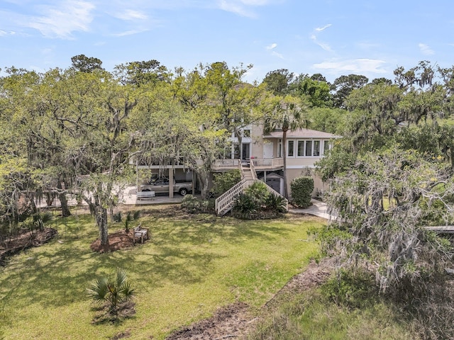 4702 Blockhouse Ln, Hollywood, SC 29449 - rear view of property featuring stairway, a lawn, a wooden deck, and a patio