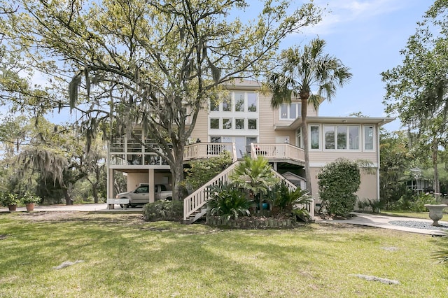 4702 Blockhouse Ln, Hollywood, SC 29449 - rear view of property featuring a lawn and stairs