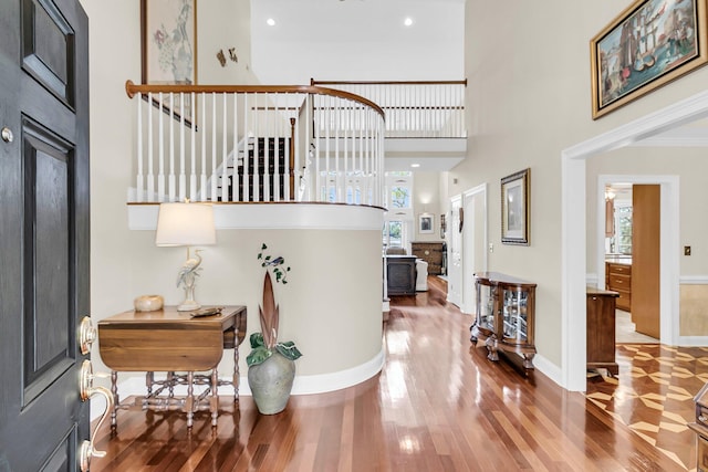 4702 Blockhouse Ln, Hollywood, SC 29449 - foyer featuring wood finished floors, stairway, baseboards, a towering ceiling, and recessed lighting