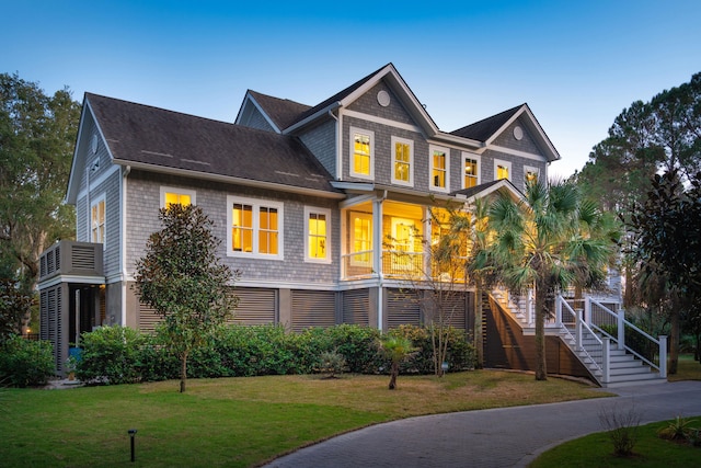 view of front of home with a front yard