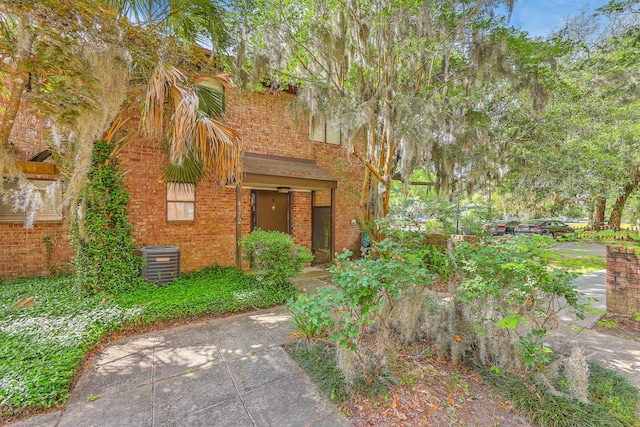 4372 Great Oak Dr, North Charleston, SC 29418 - view of front of house featuring central AC unit and brick siding