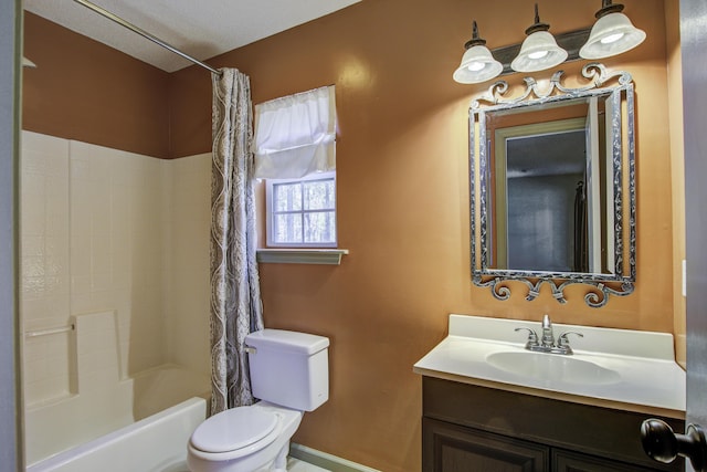 bathroom with toilet, shower / bath combo with shower curtain, and vanity